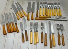 34 Pc  Vintage Assorted Bakelite   Stainless Steel Silverware   Butterscotch