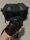 Canon Eos Rebel Sl1 Camera Bundle With Bag  Lens Caps  5 Batteries  2 Chargers