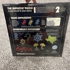 Shmuzzles The Shmuzzle Puzzle Snowflakes 168 Piece Identical Shape 1981