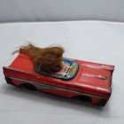 Vintage Cragstan Tin  58 Ford Car girl W ponytail Tin Friction Car Toy