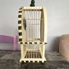 Vintage-style Table Clock features A Birdcage Design  Unique Decorative Elements