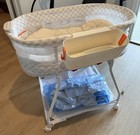 Delta Children Smooth Glide Bassinet     White Storage Basket     Vibration   Sound