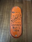 1954 Nampa Bicycle License Plate  Orange Oval 1556 Expires May 1 1954
