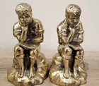 Vtg Pair Of Bookends Boy Sitting On Rock Reading Book Brass Look Cast Metal Mcm