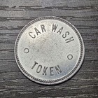 A a Rocket Car Wash Aluminum Token