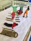 Vintage Barclay Lead Figures Two Skaters  One Sled Rider  One Skier And One Sled