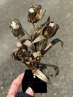 Vintage   Brutalist Petite Gold Metal Flower Art On Black Stand