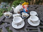 Vintage 1999 Madeline With Present Christmas Ornament And Porcelain Tea Set