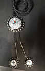 Abel Soseeah Zuni Sunface Bolo Tie Dangling Tips