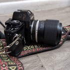 Nikon Em 35mm Slr Film Camera Black Body With Nikon 36-72mm Lens   read  