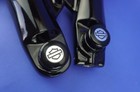 Harley 2024-2025 Road Glide  Fork Legs Gloss Black With Willy Shiny Axle Caps