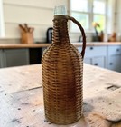 Vintage Hand Blown Glass Bottle In Handwoven Wicker Basket Rustic Boho Jug
