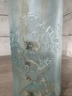 Vintage Graphics Indian Native American Embossed Glass Bottle Advertising