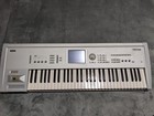 Korg Triton 61-key Music Workstation Synthesizer W hard Case Classic Silver Used