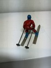 Vintage Barclay Lead  man On Skis  In Yellow With Blue Trim 