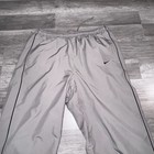 Vintage Y2k Nike Grey Track Pants With Side Piping And Zip Hems