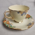 Delphine Bone China England White Stemmed Rose Tea Cup And Saucer Set