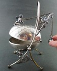 Wilcox  1938 - Cherub On Egg - Antique Mechanical Jewelry Box - Quadruple Silver