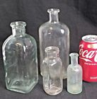 Lot Of 4 Vintage Clear Glass Collectible Bottles Various Sizes