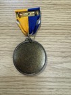Lamp Of Knowledge Medal With Blue And Yellow Ribbon Pin
