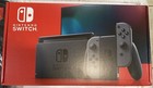 Nintendo Switch - Gray Joy   con Hac-001 32gb Plus Universal Folio Case Brand New