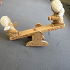 Small Vintage Wooden Seesaw With Two Cute Little Wooden Dolls