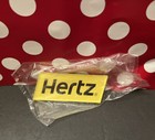 Rare New Nip Sealed Hertz Car Rental Yellow Logo Brand Magnet Collectible