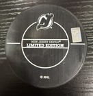 Travis Zajac 1000th Game Commemorative Puck New Jersey Devils