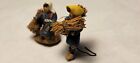 Vintage Very Tiny Clay Miniature Man 1  Tall   Woman Carrying Stick Bundles
