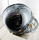 Raiders On Field Football Helmet By Riddell  Autographed By Howie Long 
