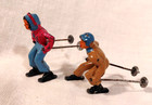 2 Vintage Barclay Lead Figures  ski-less  Skiers Male In Tan Female Pink   Blue