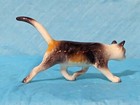 Retired Hagen Renaker Prowling Calico Cat