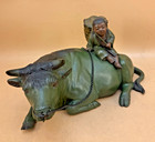 Japanese Taisho Bronze Okimono Of A Boy Seated On A Bull  Signed