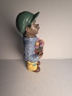    vtg Black Americana Boy Holding Flower Basket Figurine Resin Green Cap 6 Inch