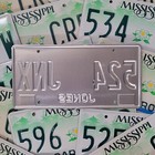 Mississippi License Plate     free         1 W random Letters     s   Magnolia Flower