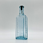 Antique  Vintage Burnetts Standard Flavoring Extracts Cork Top Bottle Aqua Blue