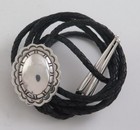 Southwestern Sterling Silver Deeply Stamped Domed Concho Style Bolo Tie