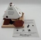 Pegged Pyramid Puzzle By Harry Nelson  Renowned Mathematician