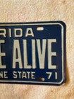 1970 1971 Florida Arrive Alive Booster License Plate Tag Sp