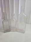 Antique Vintage Embossed Glass Medicine Bottles