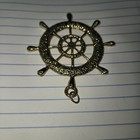 A Gold-tone Nautical Ship s Wheel