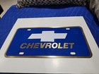 1990s Brass Chevrolet License Plate Brand New