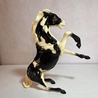 Black And White Rearing Horse Plastic Figurine