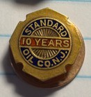 Two  2  14k Gold 1 W diamond Standard Oil Co Of Nj Anniversary Milestone Pins