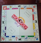 Monopoly Deluxe Edition 100    Complete - Pieces New In Plastic -  Slight Box Wear