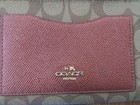 Coach Corner Zip Wristlet In Signature Canvas