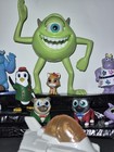 15 Pc Disney Collector Lot Monsters Inc  Nemo Cars Toy Story T o t s Mcdonald s 