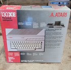 Atari 130xe Computer  New In The Box  Complete W  Power Supply Cartridge Manuals