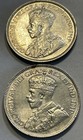 1928   1929 Canada 25 Cents - Better Grade cleaned