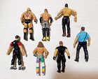 Wwe wwf Action Figure Lot Featuring 7  Figures  Shawn Michaels Mick Foley Brock 